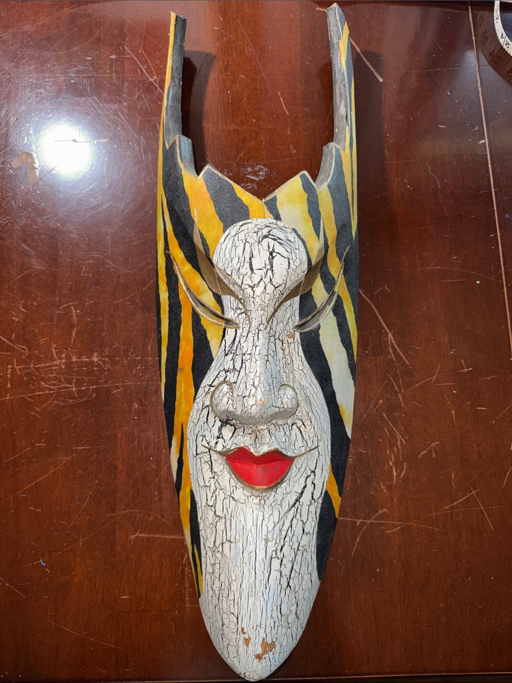 Hand-Carved Decorative Mask with Black, Yellow, White & Red Accents